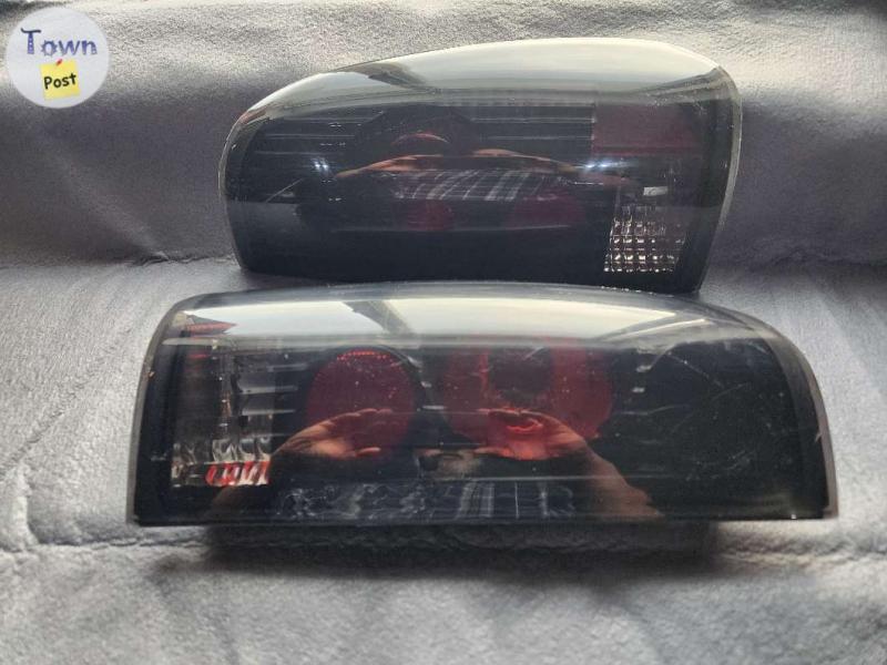 Photo of 97-03 f150/99-06 250-350 smoked tail lights 