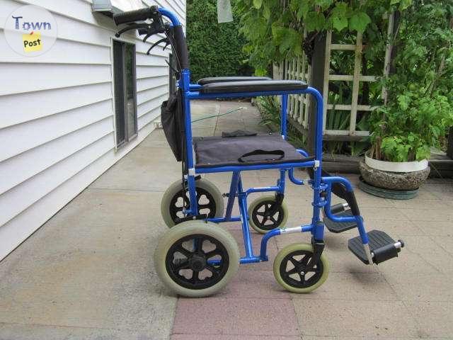 Photo of INVACARE BLUE "GREAT BIG WHEEL" TRANSPORT WHEELCHAIR FOR SALE