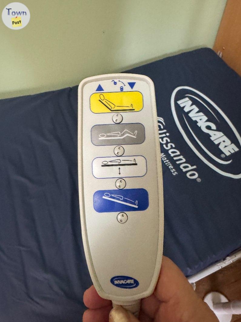 Photo of Invacare electronic hospital bed